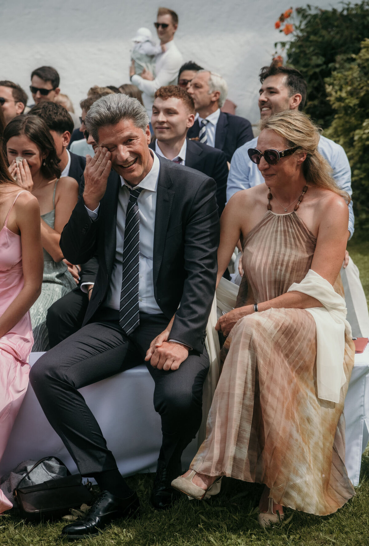 An emotional moment during the ceremony, where the guests can't hold their tears back.