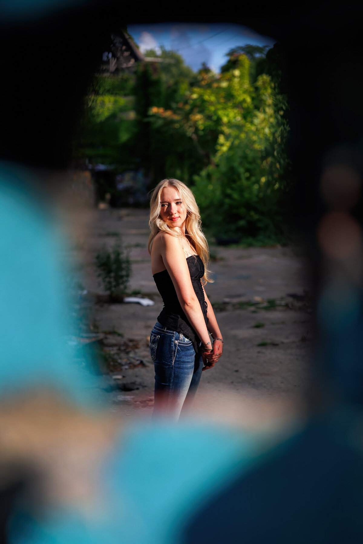 This Cleveland senior portrait has Maria framed by an old window.