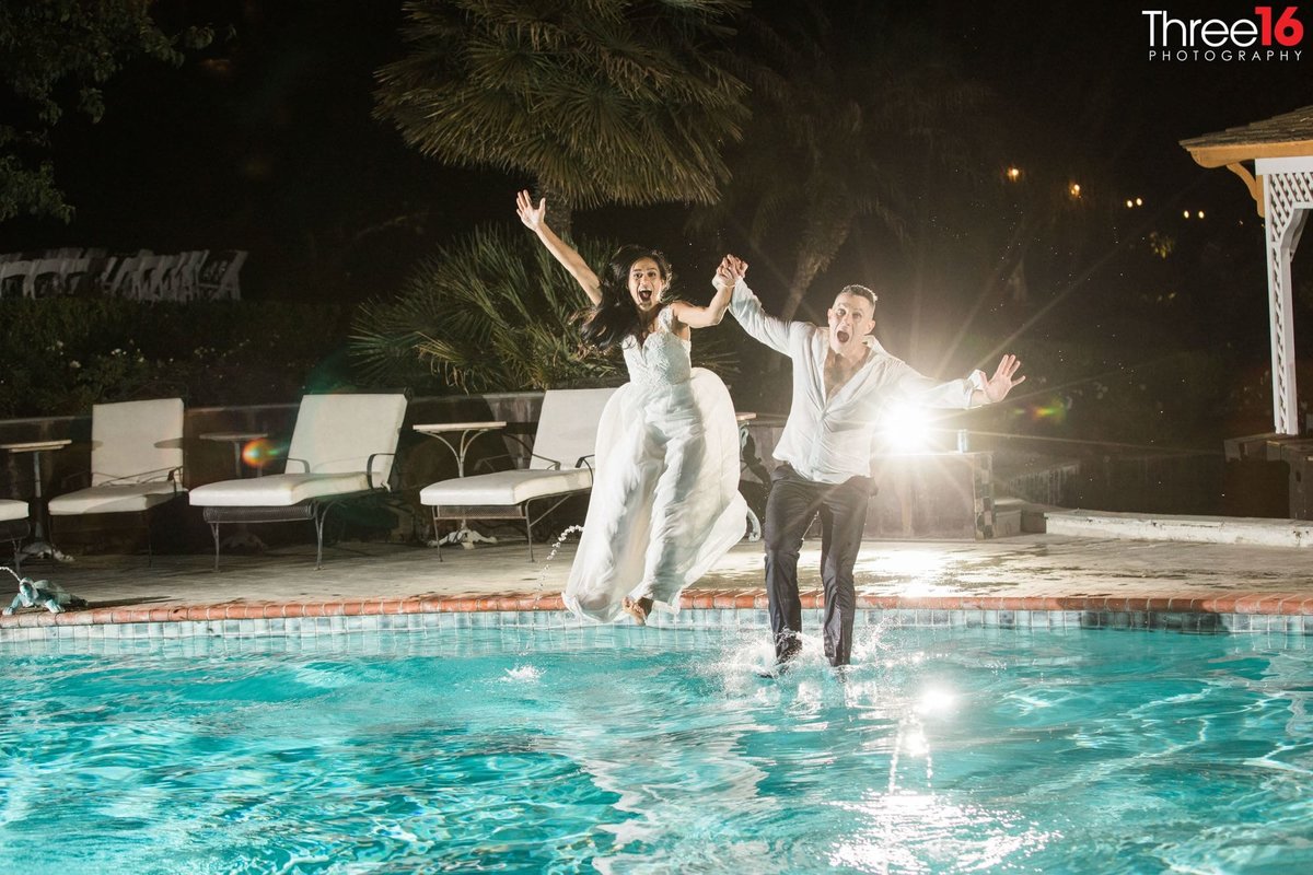 Newly married couple take the plunge into the pool!