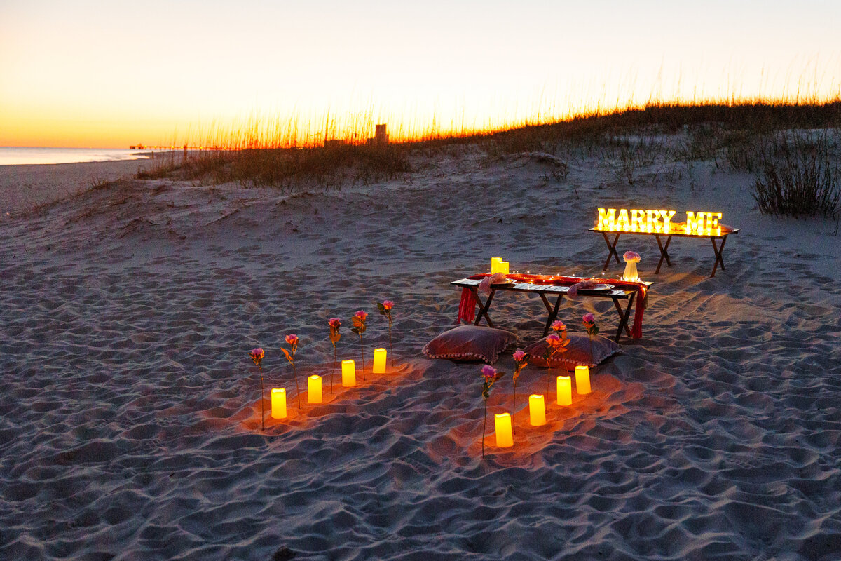 Sunset proposal package wth portraits on beachfront