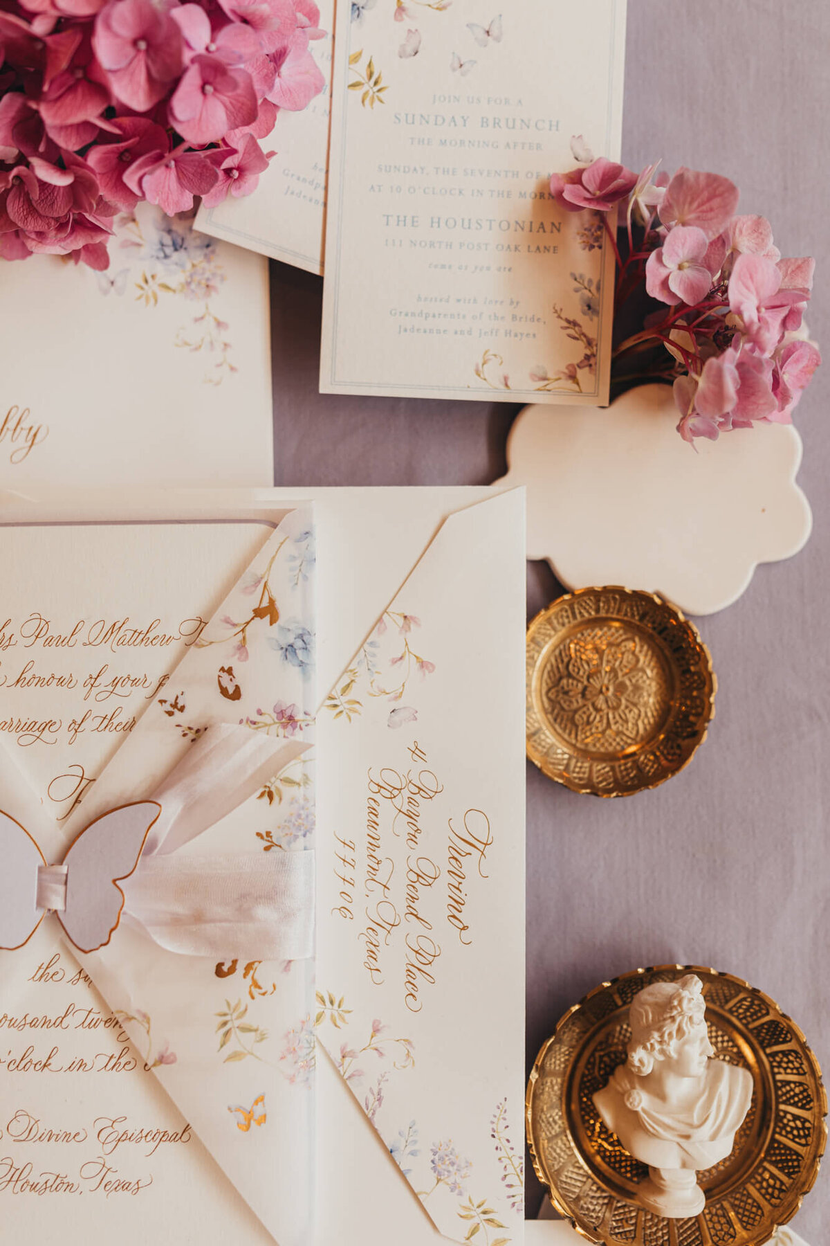 flat lay of hydrangeas and invitations.