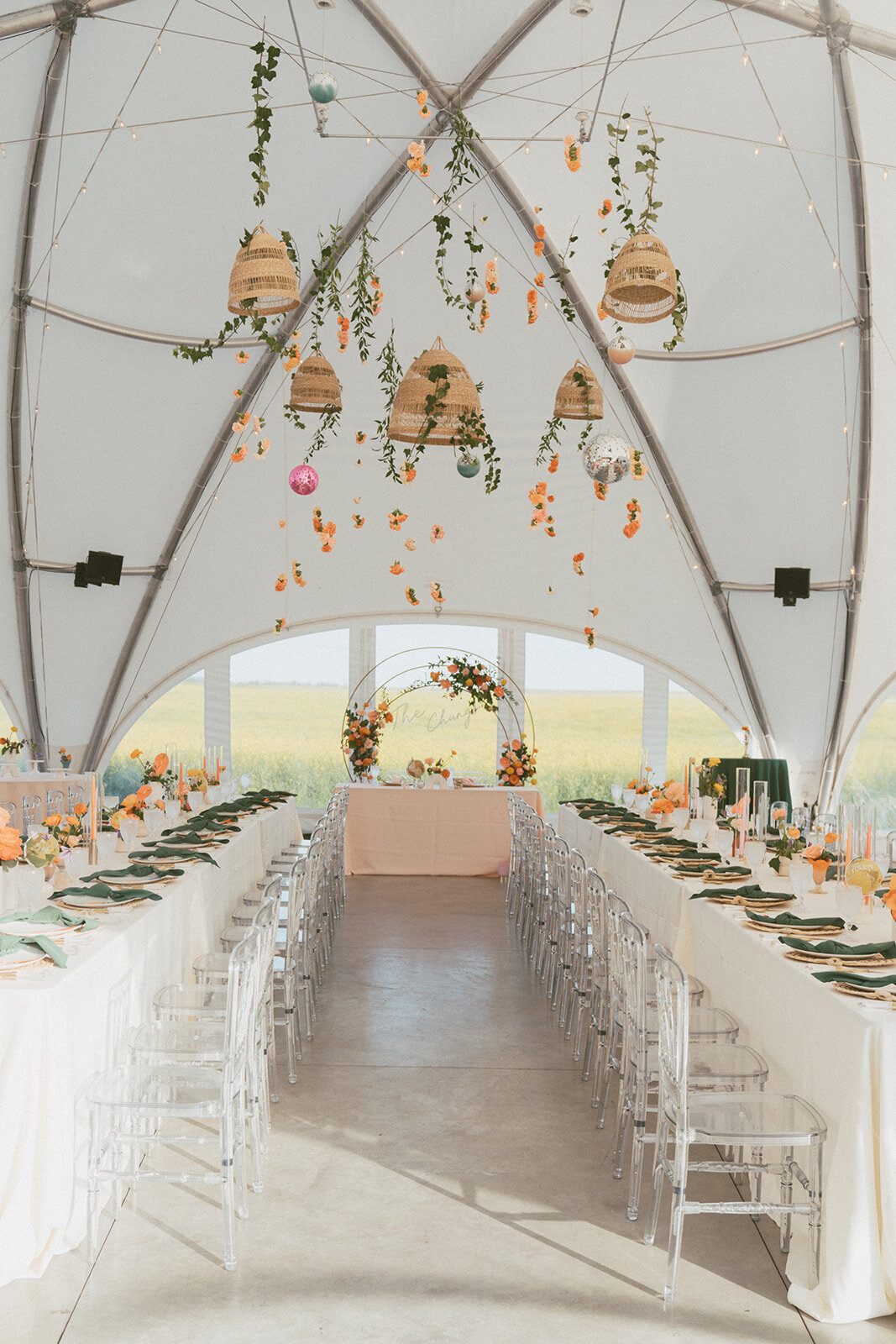 Colourful summer wedding reception at River's Edge in Devon Alberta - designed by Rebekah Brontë Designs, bright summer reception design inspiration