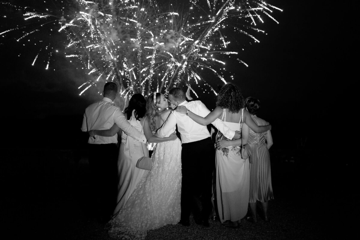 Bride and Groom kissing during fireworks at Came House
