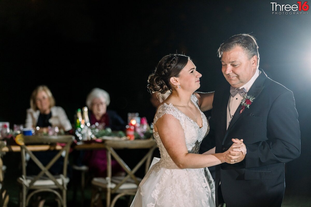 Bride dances with her father at her wedding