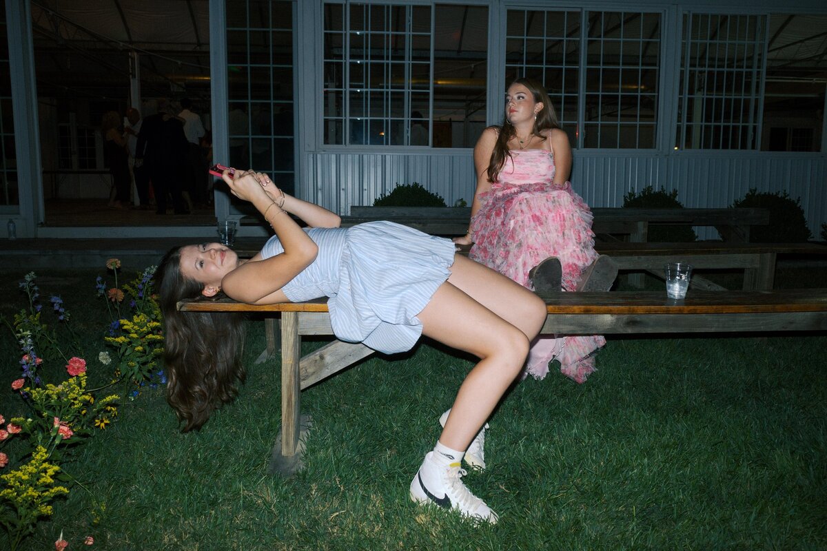 wedding-guests-relaxing-mid-party
