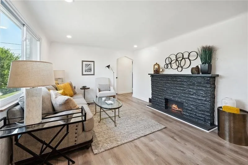 Professionally staged living room designed to maximize home value and buyer appeal