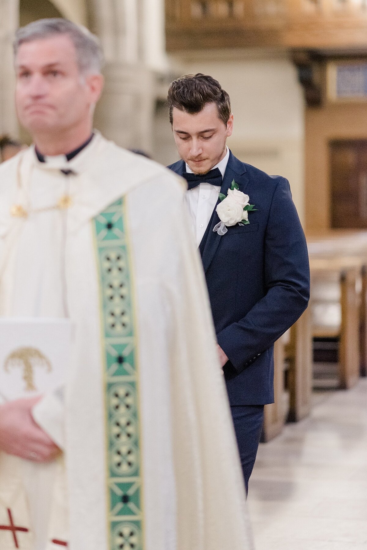 Groom walking down the aisle at downtown Columbus, Ohio wedding taken by Ohio Wedding Photographers