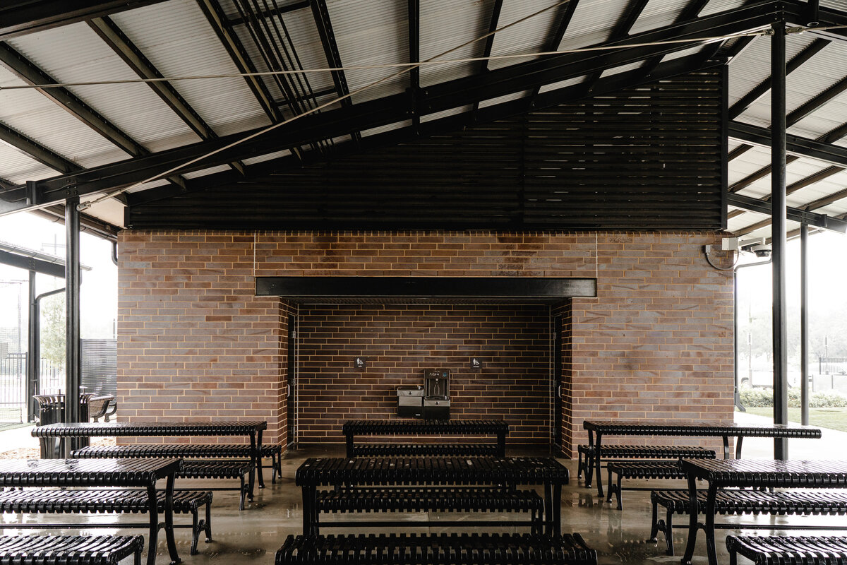 restroom and dining area under large shade structure