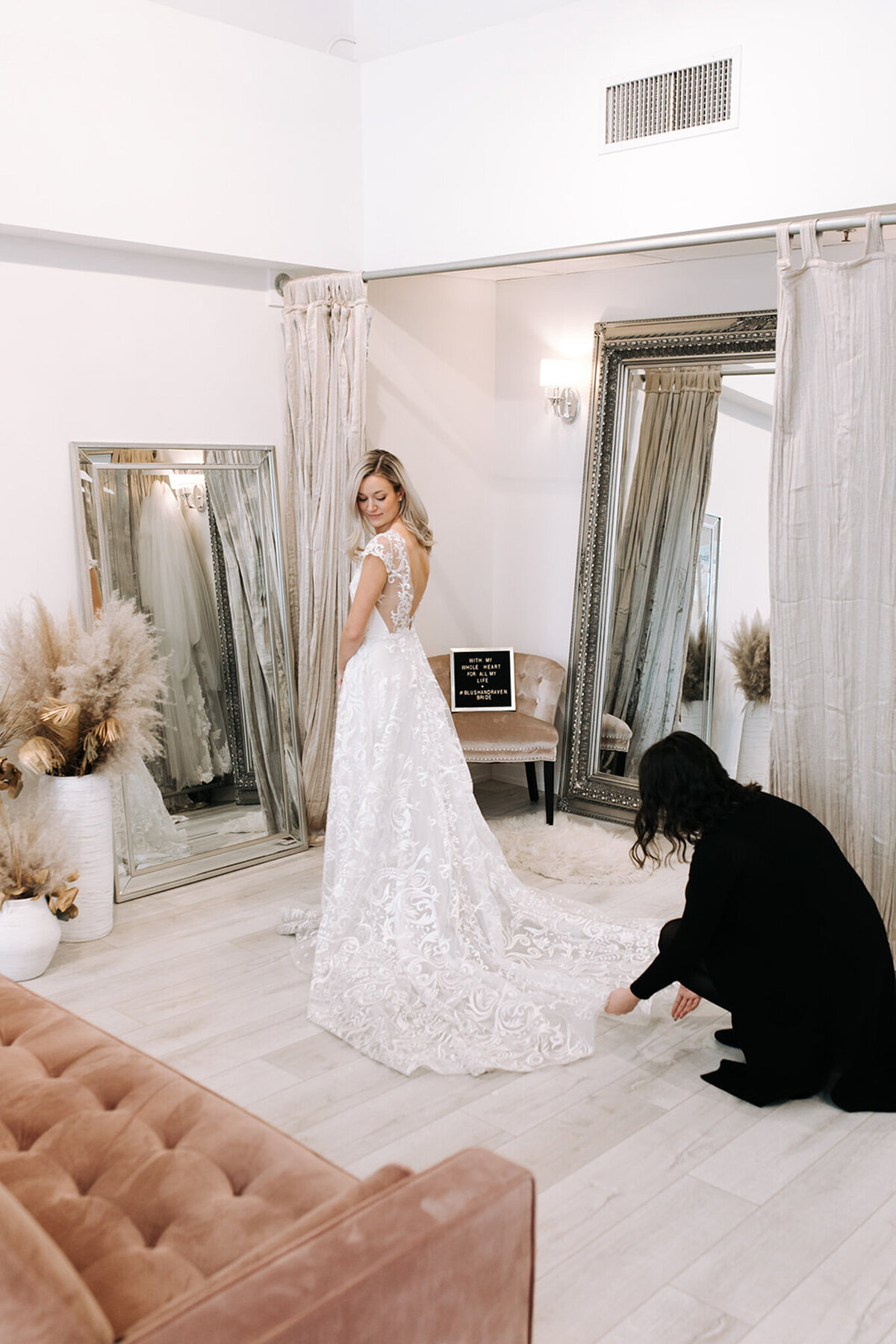 Bridal fitting at Blush & Raven, a couture wedding bridal boutique based in Calgary, Alberta. Featured on the Brontë Bride Vendor Guide.