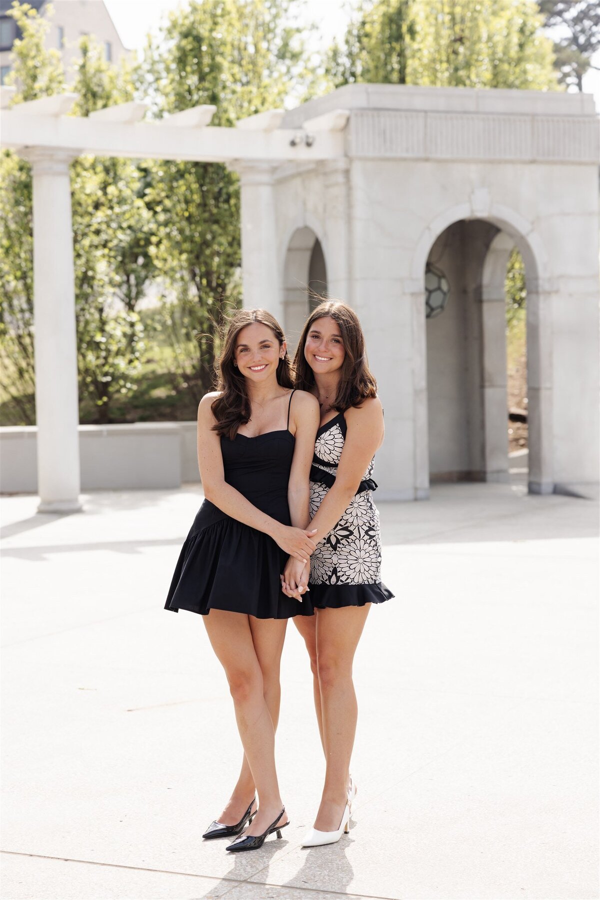 Senior Girls Posing in Bright, Feminine Dresses