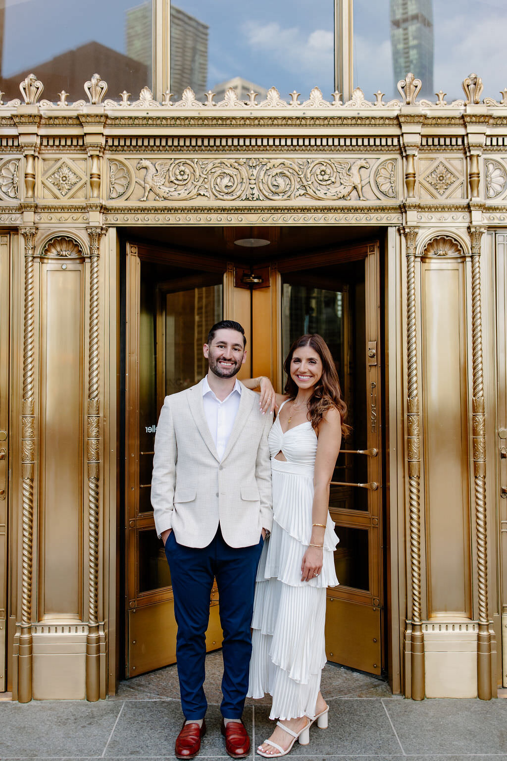 An engagement photography session at The Wrigley Building and North Ave Beach in Chicago, Illinois - 3