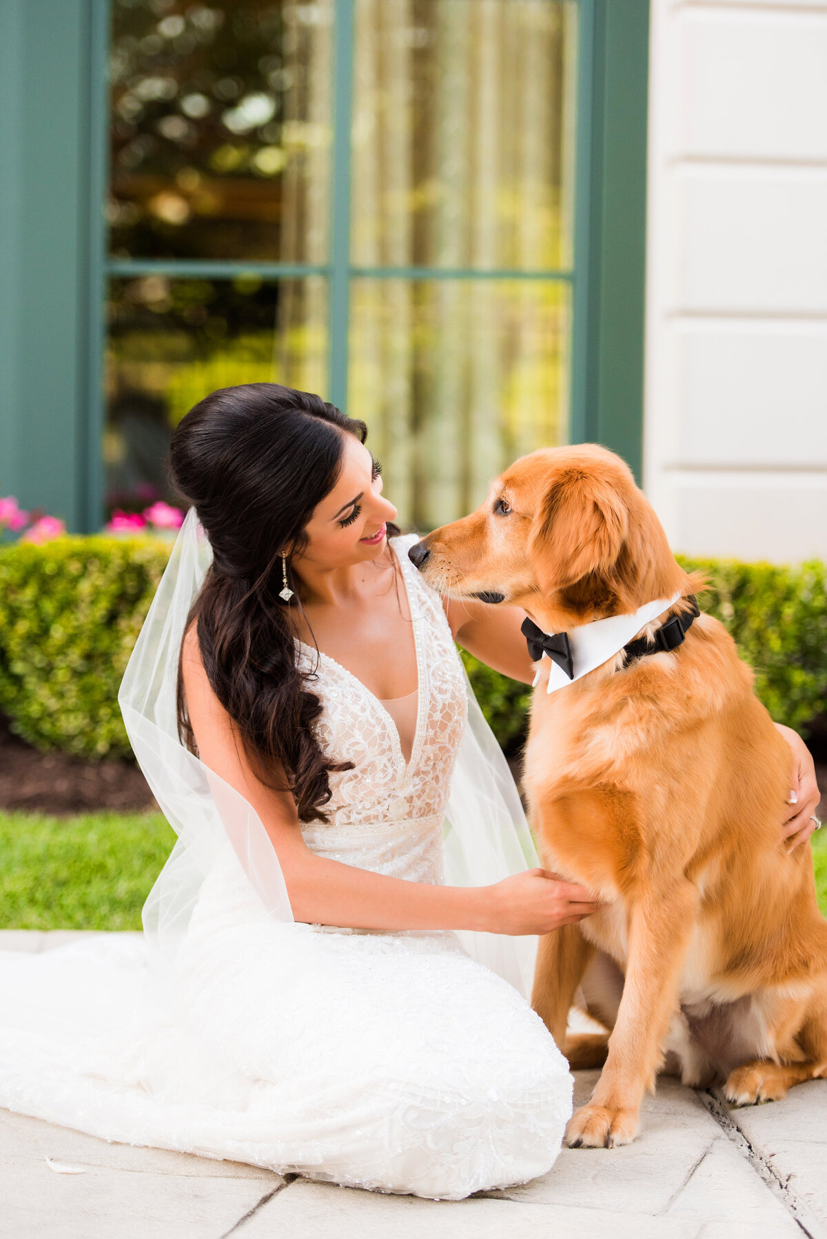 bride and dog on wedding day at nemacolin resort
