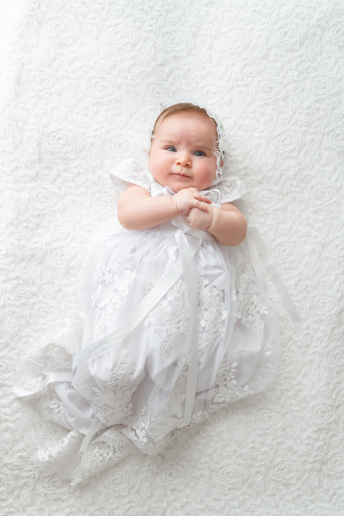 Baby girl wearing baptism gown Baby and child photographer in Chandler, AZ00027