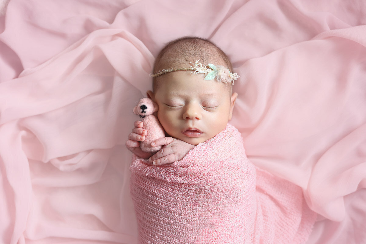 Baby wrapped in pink photo session in Vancouver