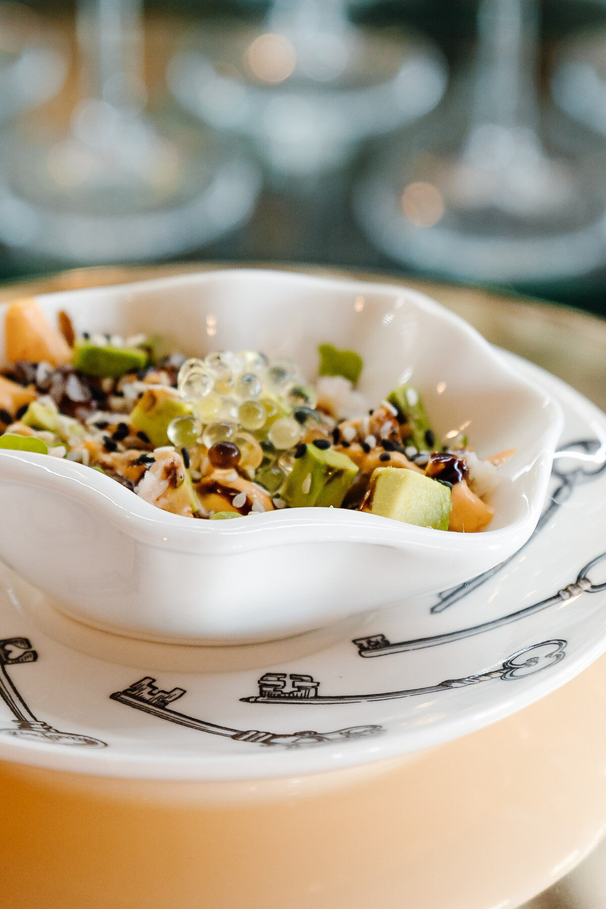 A small bowl with food on it on a table