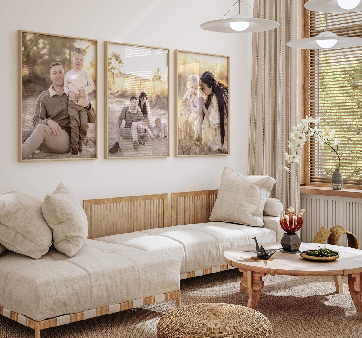 A living room with three large framed prints of photos taken by Justine Renee Photography.