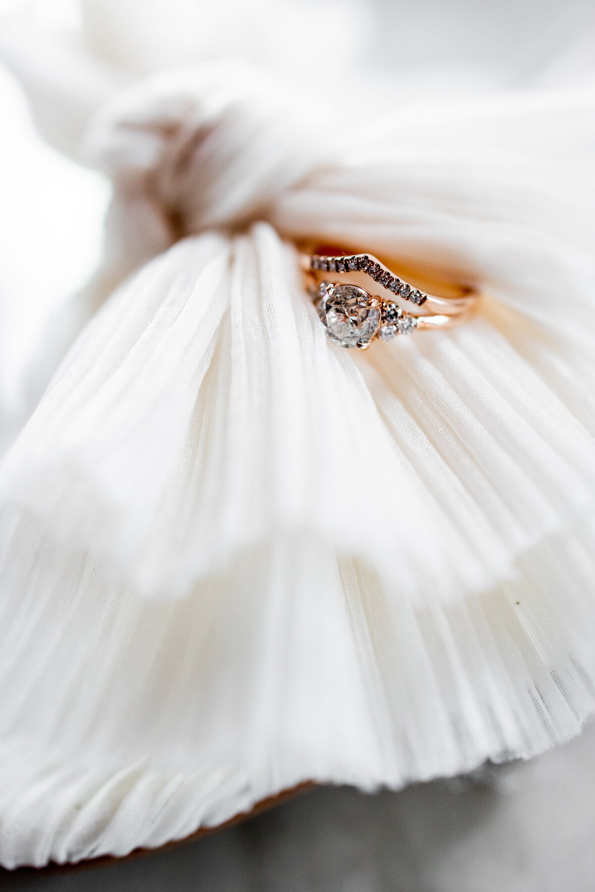This captivating close-up shot of a dazzling solitaire engagement ring exemplifies timeless elegance. Set against a softly blurred background, the focus is on the brilliant cut of the diamond, which catches the light with every movement. Ideal for couples seeking inspiration for their engagement jewelry, this image showcases the beauty and intricate details that make such a piece a forever treasure. Perfect for bridal websites or jewelry designers looking to highlight the exquisite quality of their craftsmanship.
