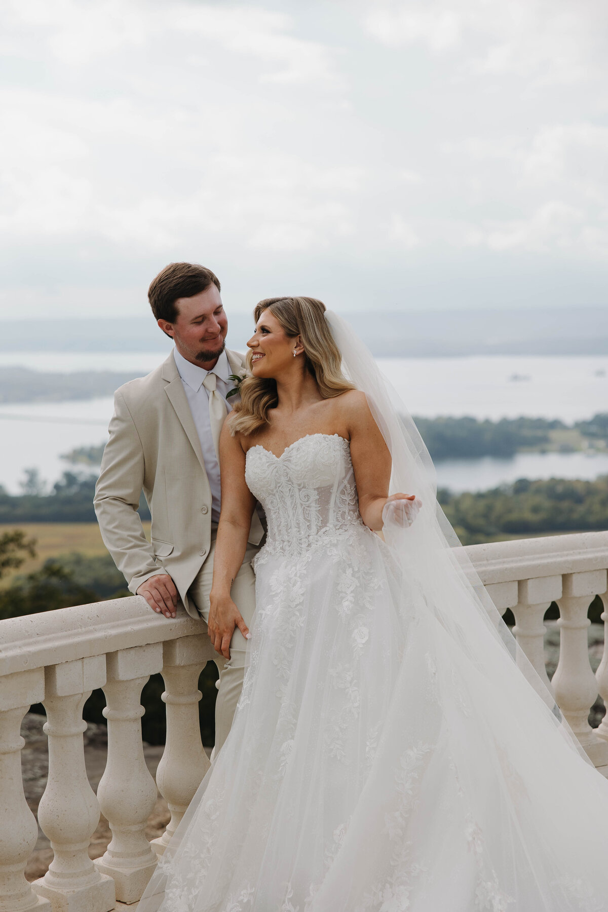 Bride and groom posed in an outdoor ceremony space in Section, AL