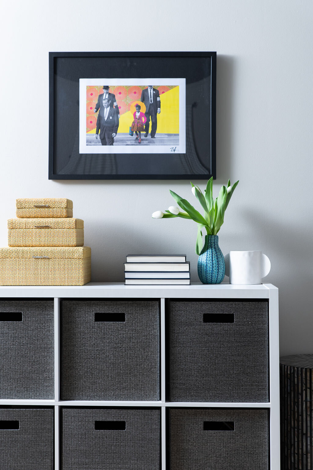 a cube organizer with black bins