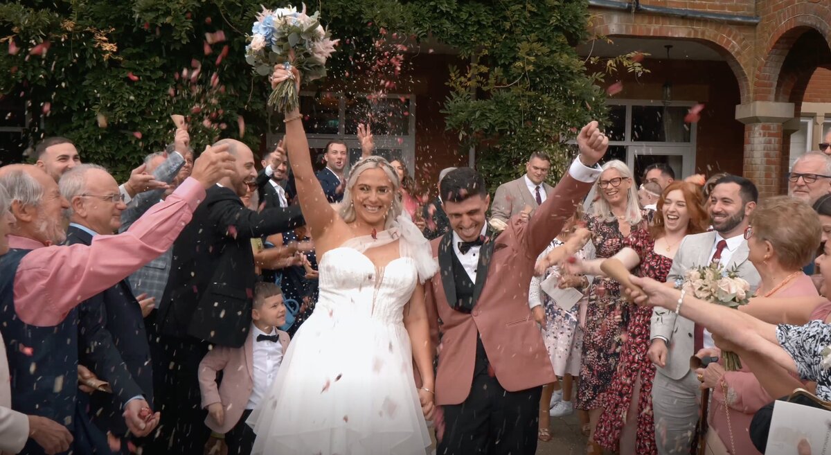 Bride and Groom in a scene from their wedding highlights film captured by Hertfordshire Wedding Videographer HC Visuals