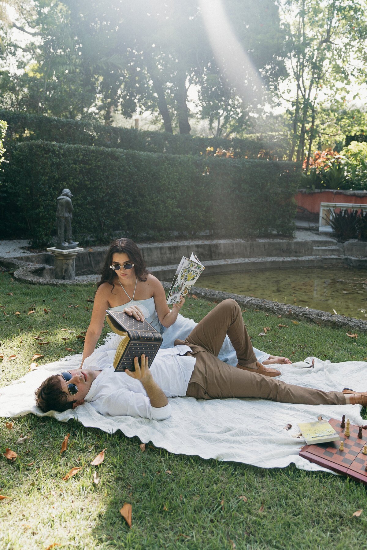 Couple in a park having a picnic taken by film wedding photographer, Shelby Ann Photos