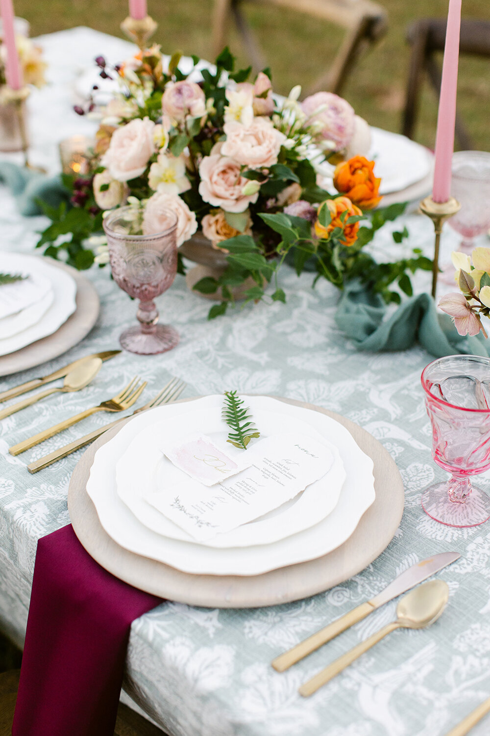 Table setting with menu on plate.