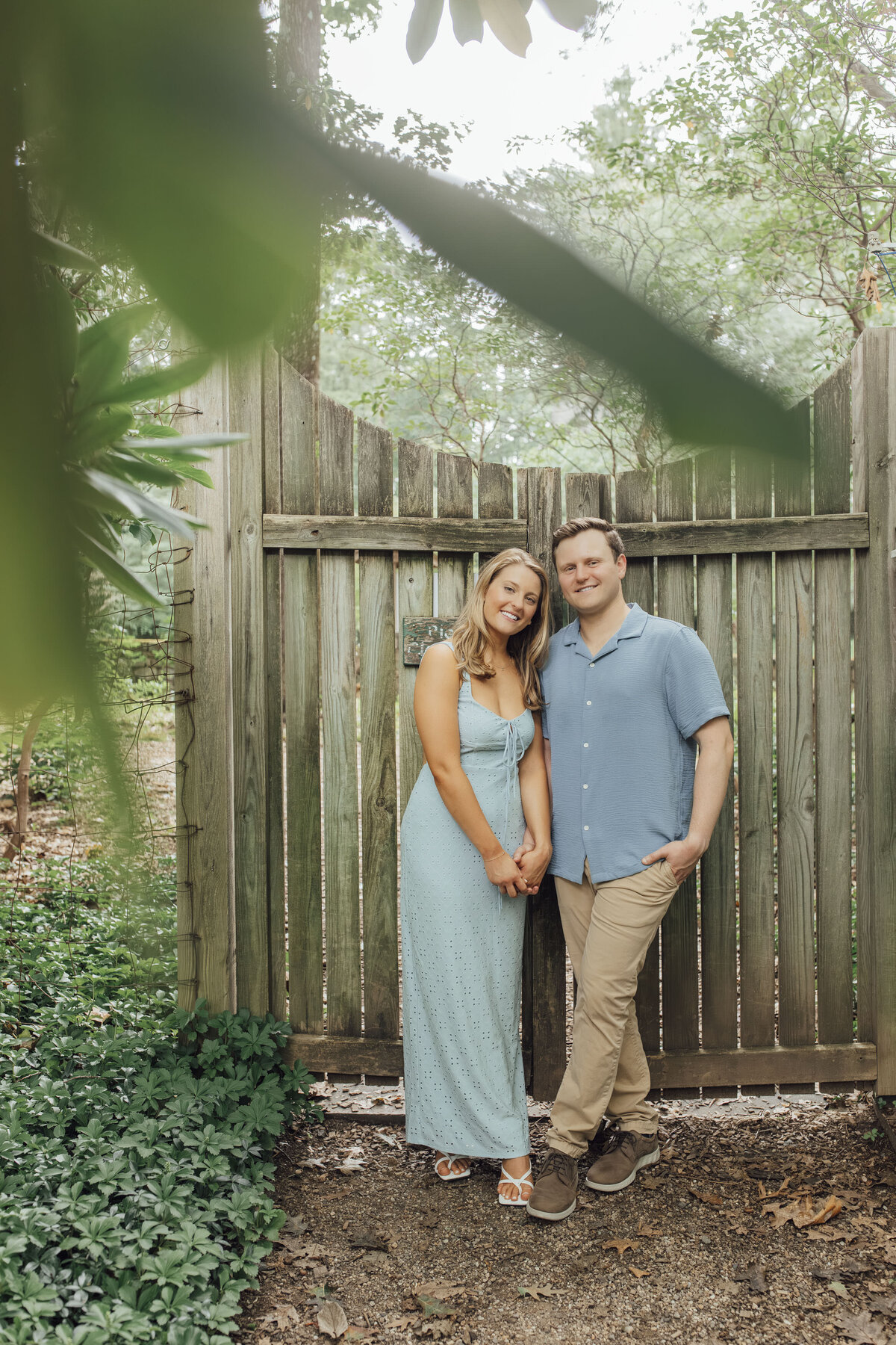Proposal Photographer | Groom-to-be proposing in the flower gardens surrounded by greenery at Cross Estate Gardens | Bernardsville, New Jersey