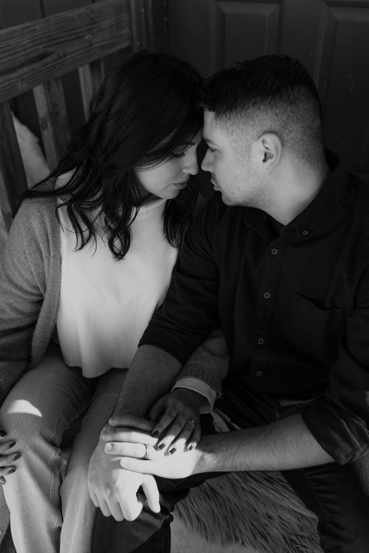 black and white image couple embracing