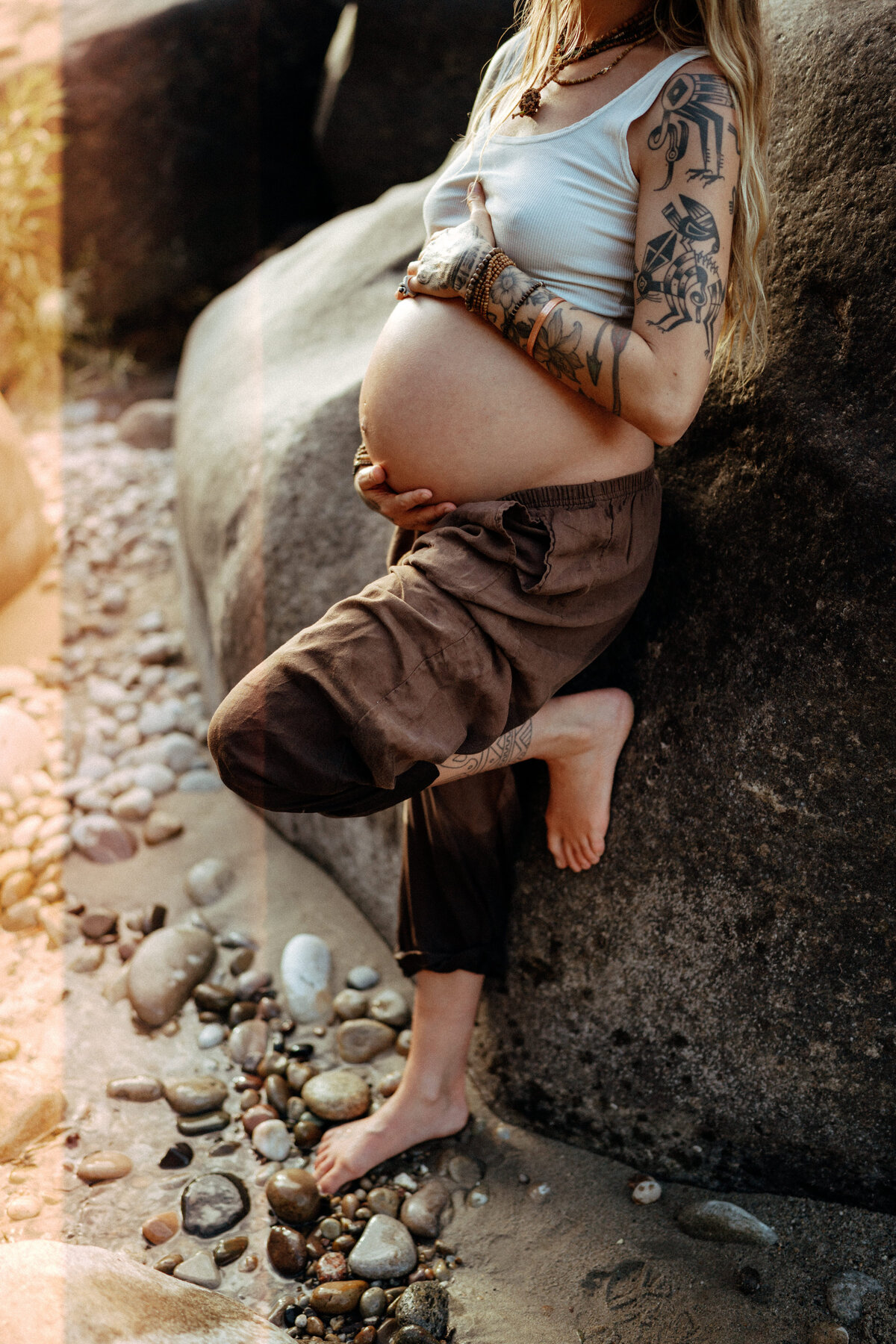 Couple during golden hour engagement and maternity shoot in Riggins, Idaho wedding/elopement - photographed by The Storytellers