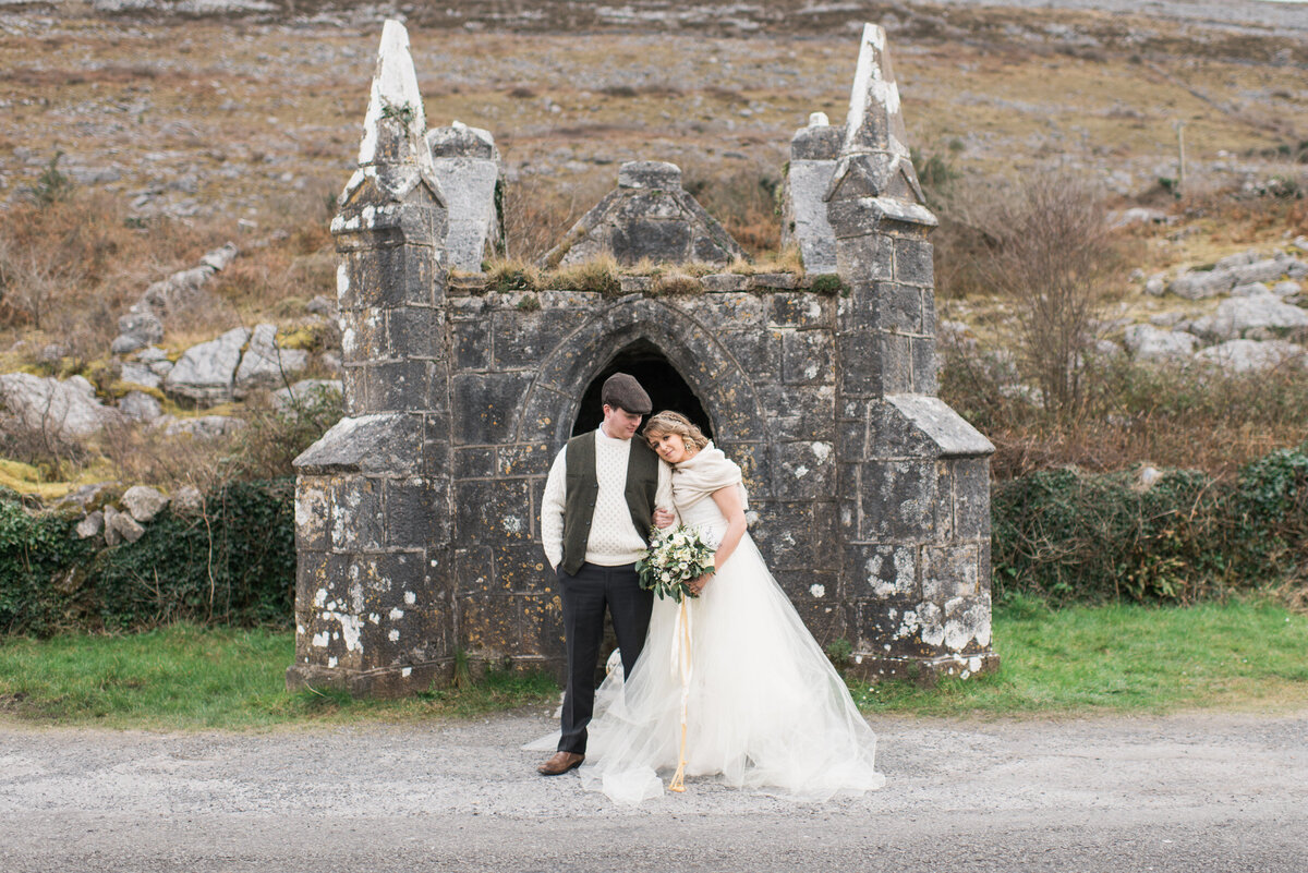 Kate-Murtaugh-Events-Ireland-international-destination-wedding-planner-Irish-elopement-couple-County-Clare-wildflower-bouquet-ancient-relics