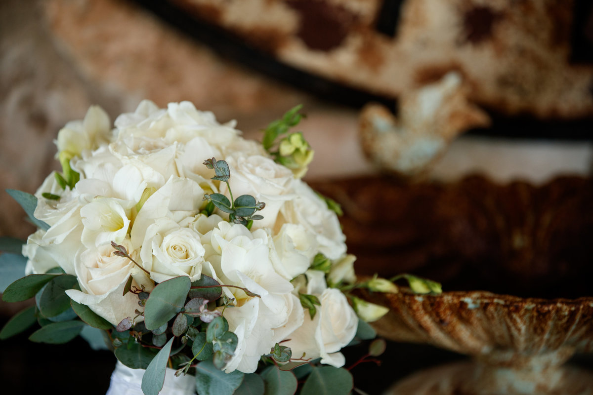 Austin wedding photographer pecan springs ranch wedding photographer brides bouquet