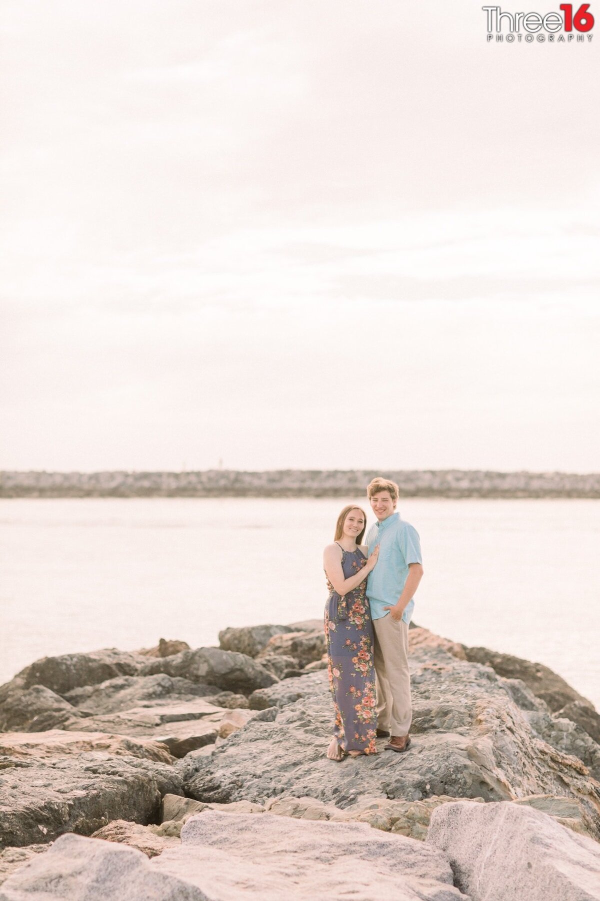 Engagement photo session on the jetty at Corona del Mar State Beach