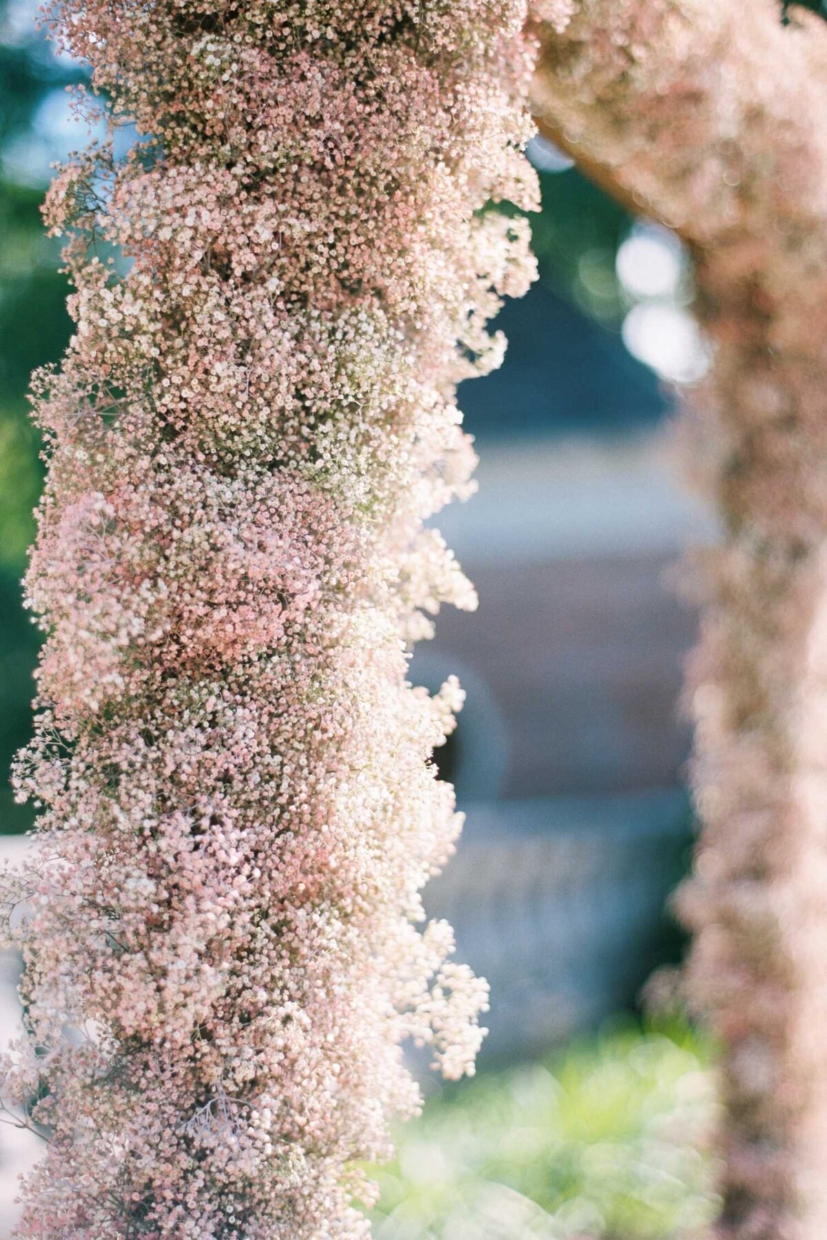 Pink Babys Breath Ceremony Arch at Luxury Chicago North Shore Garden Wedding Venue