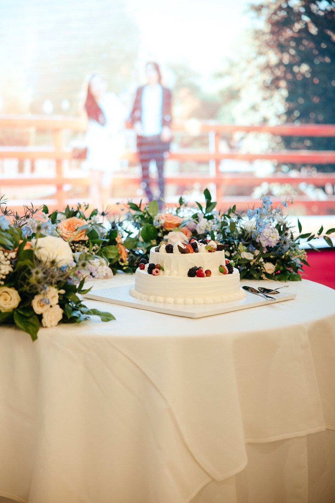 Wedding cake design with greenery on the table