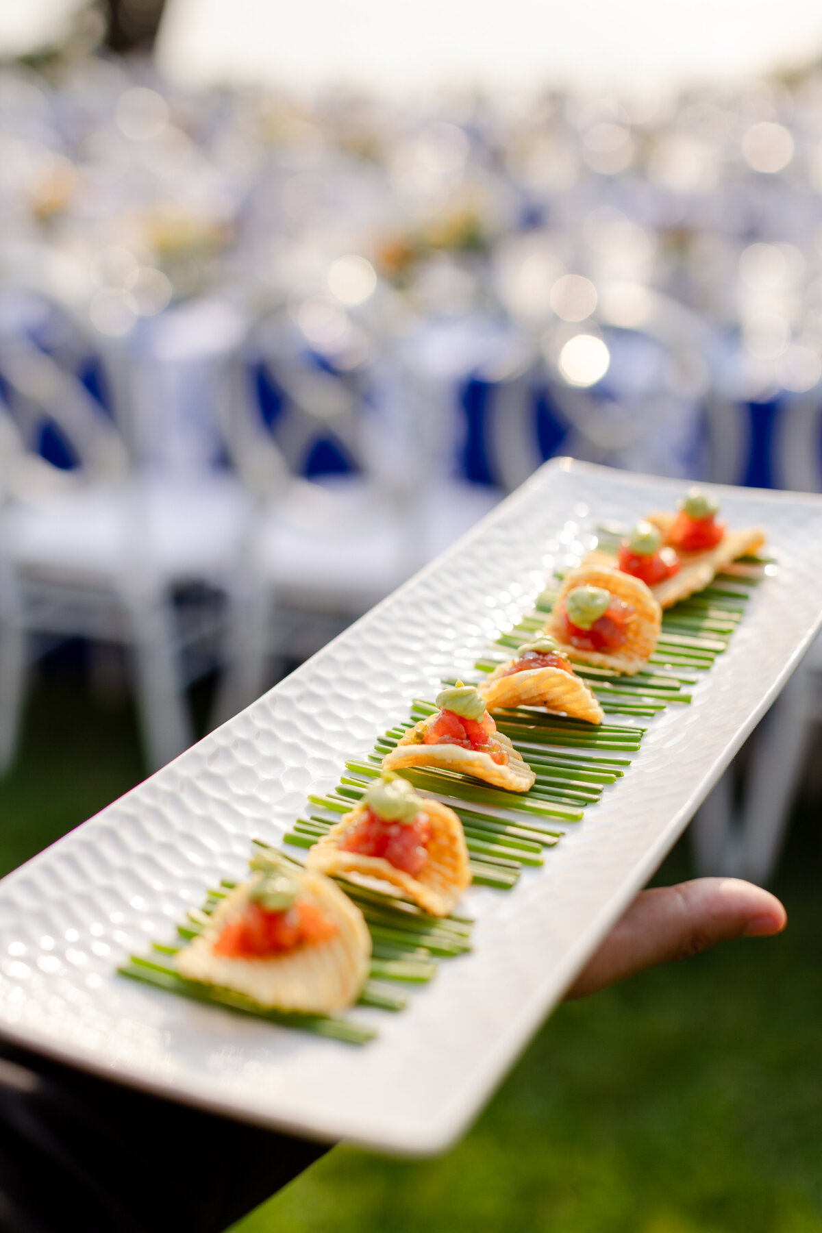 a tray of hors d'oeuvresat during welcome drinks for the outdoor rehearsal dinner at the Wainwright House in Rye