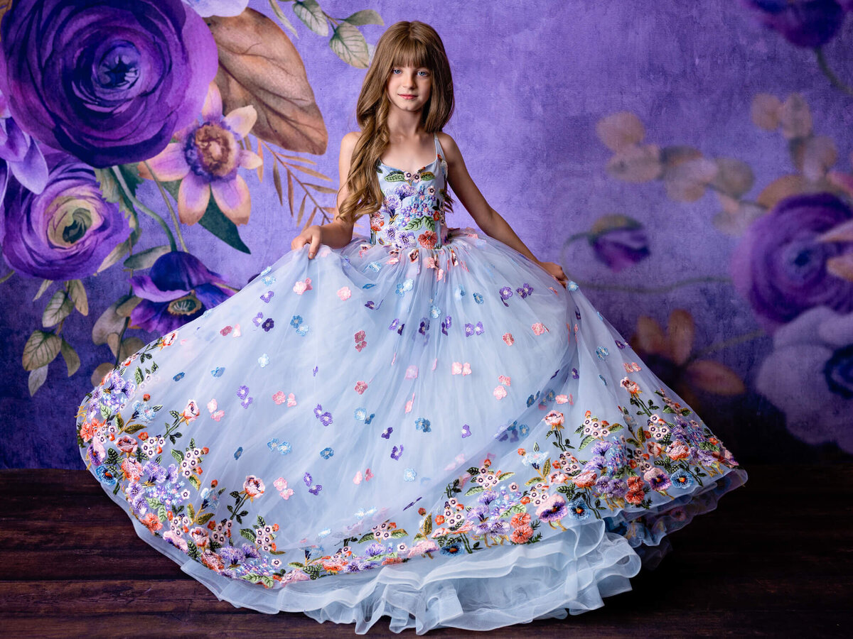Girl twirls in princess dress in Prescott kids photography by Melissa Byrne