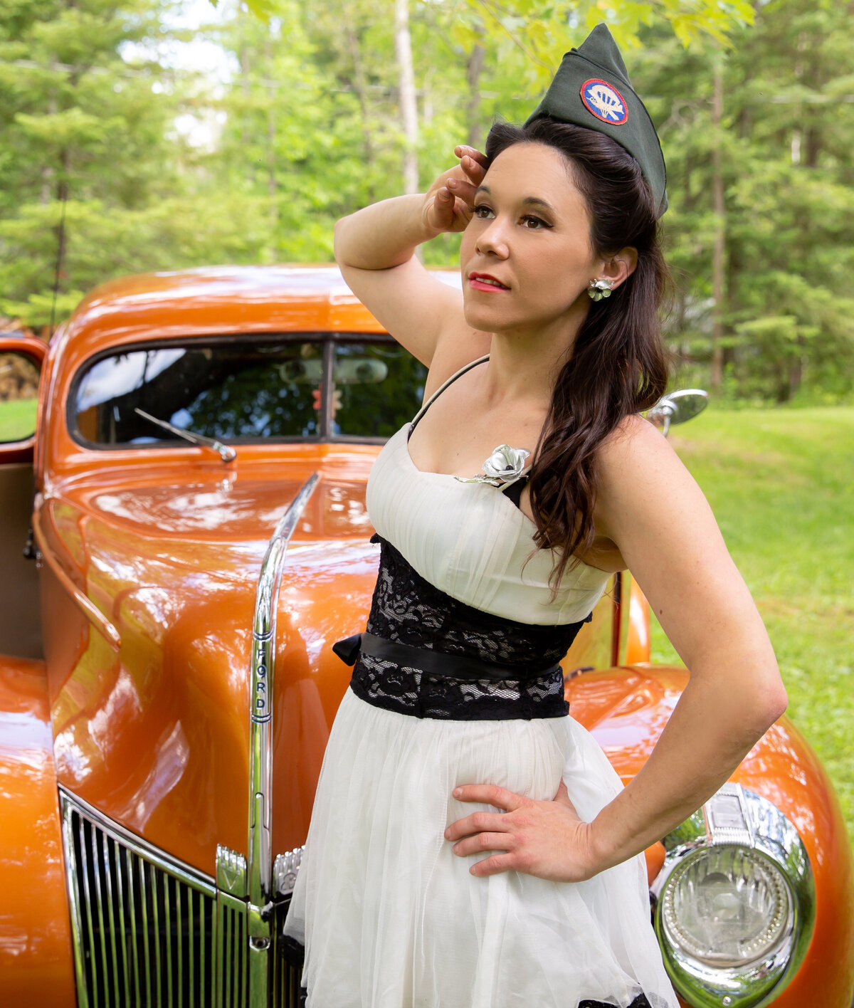 goddess studio boudoir woman pinup style old army hat vintage old ford pickup millitary salute white dress yellow ribbon