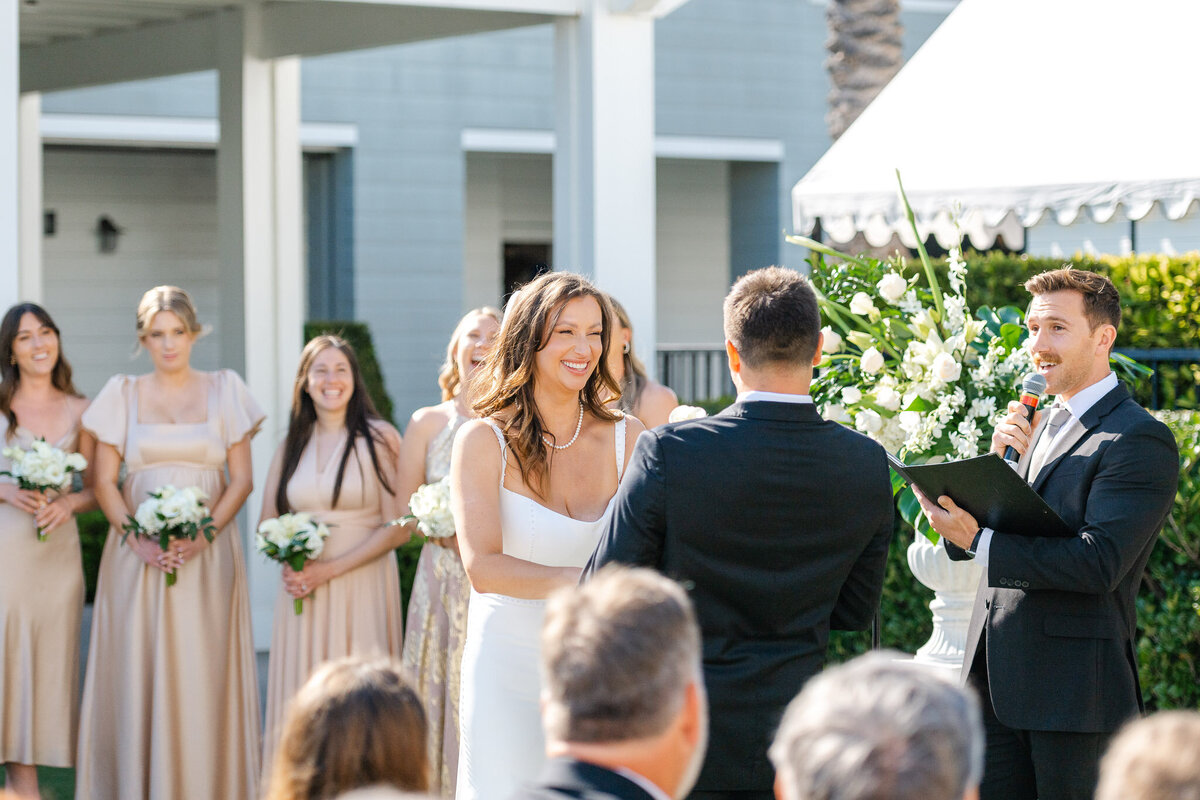 Bride and groom exchange vows at their outdoor ceremony at Lido House