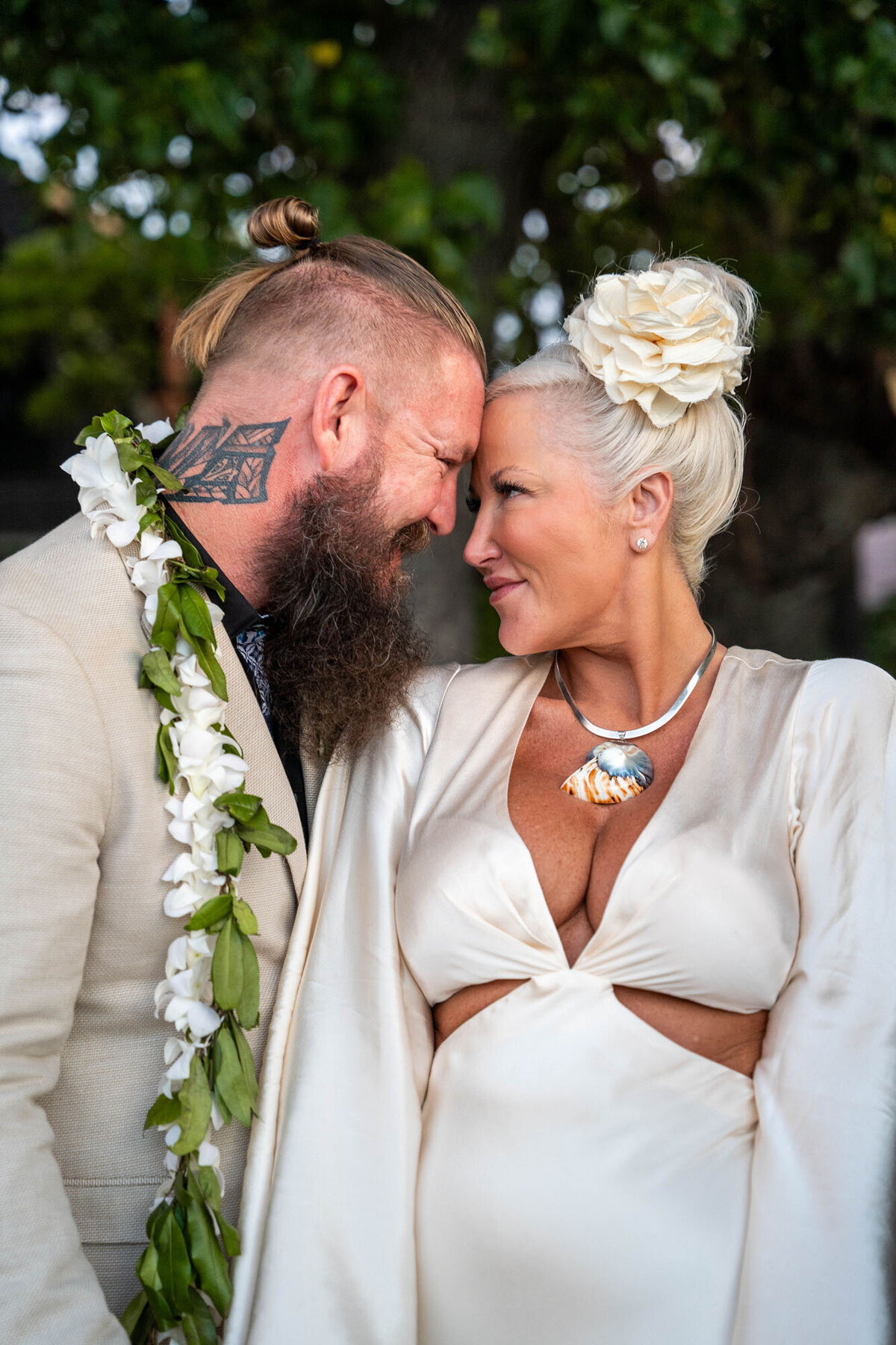 Couple looking at each other taken by one of the top big island wedding photographers
