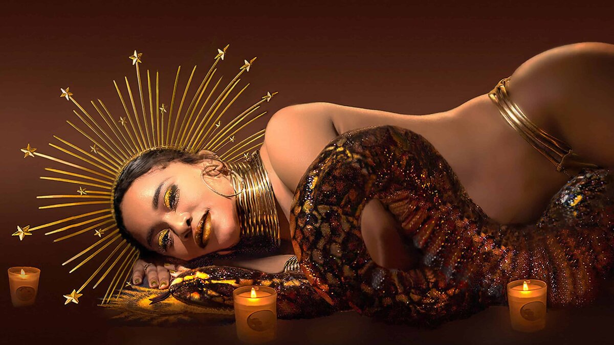 Goddess lying with snake