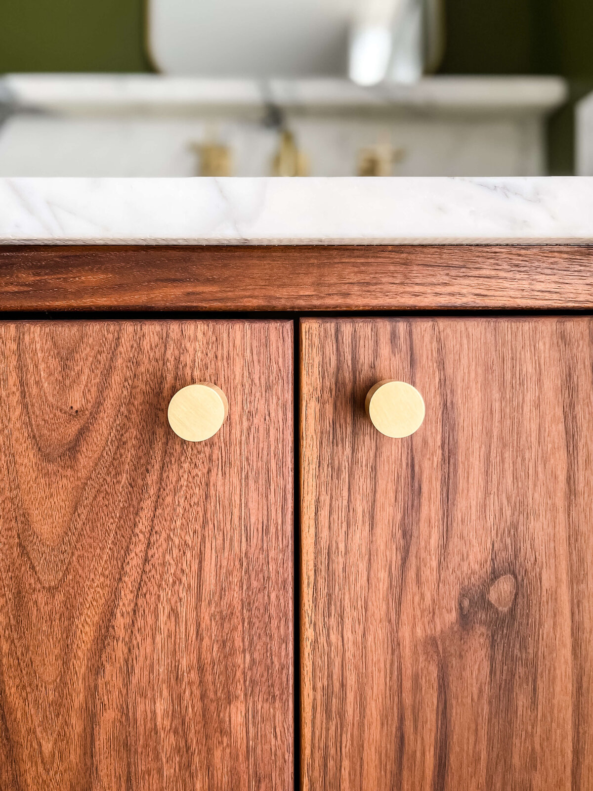 brass-knobs-on-walnut-vanity