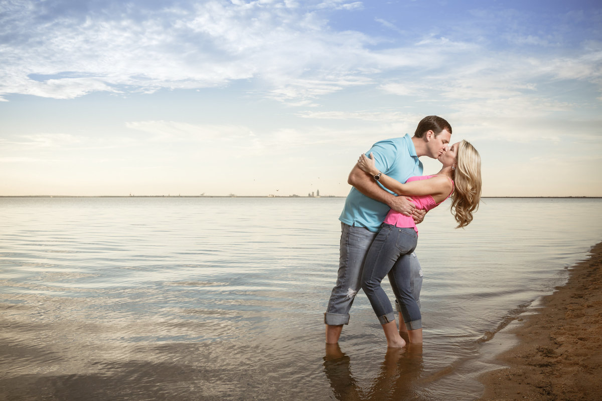Rachel and Matt share a kiss during their engagement session in Daphne, Alabama.