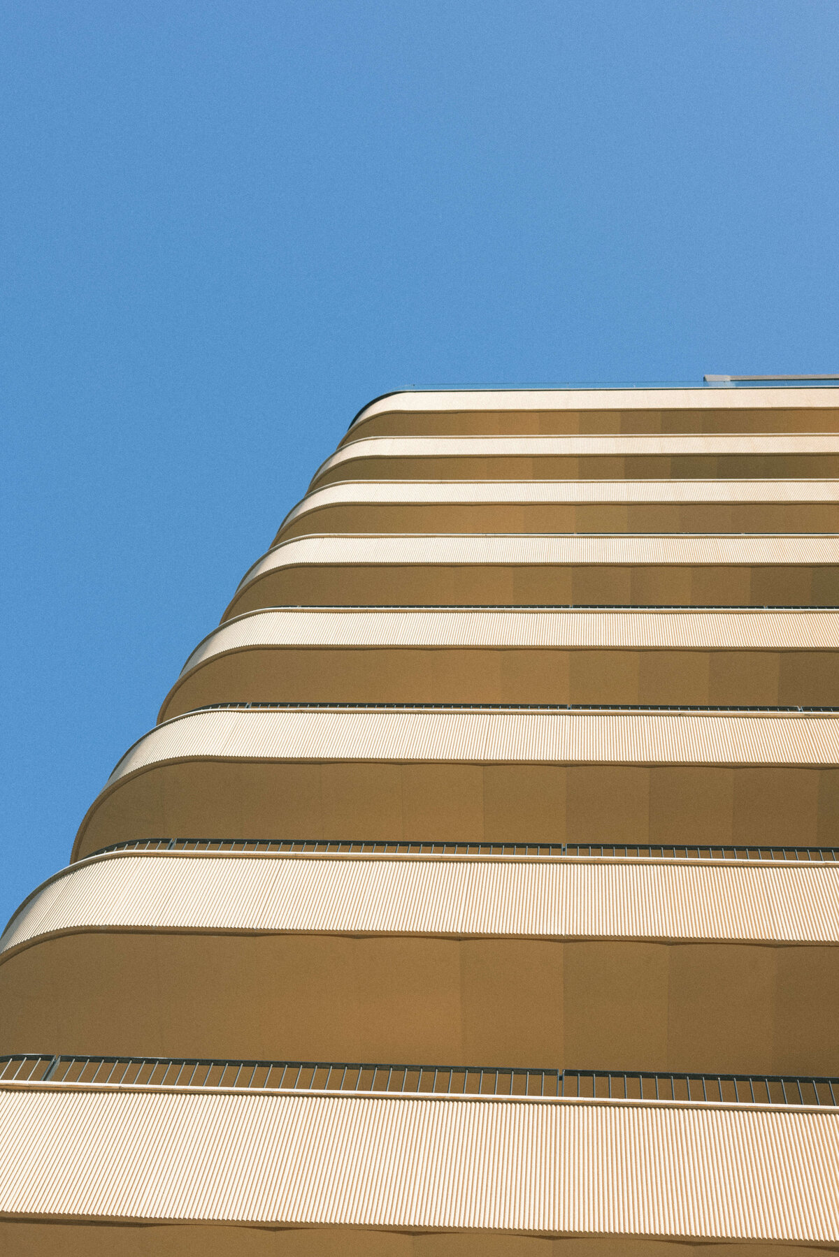 Modern architecture of Soho House Rome against clear blue sky

