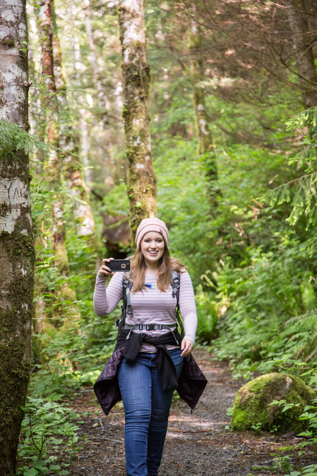 Jessica Bowles  hiking with a phone in Ketchikan, Alaska