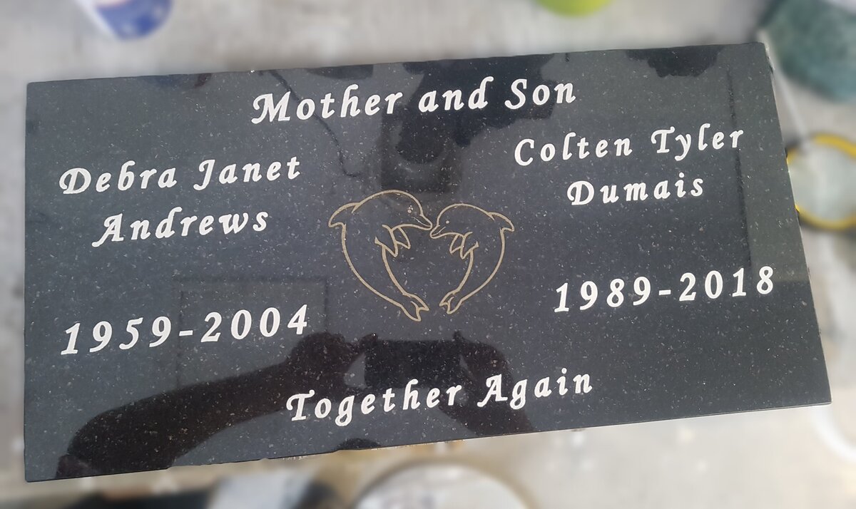 dolphin design on a gravestone custom