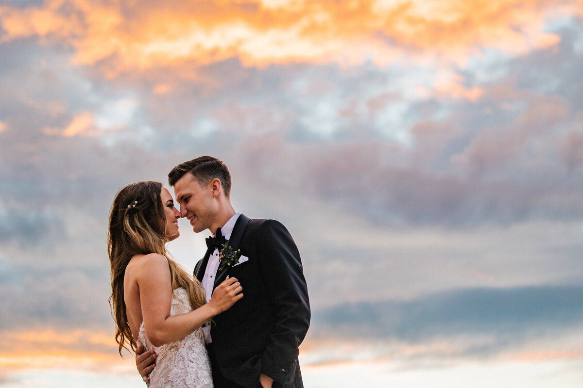 Sunset photos of a bride and groom at the Baltimore museum of industry wedding