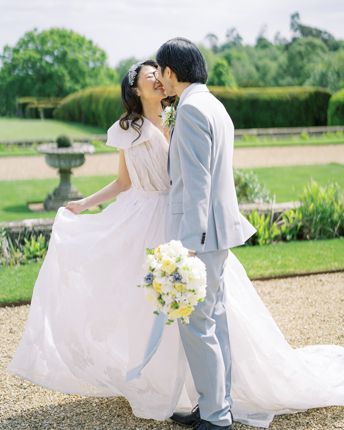 Bride and groom during portraits at stately home wedding venue Somerley House