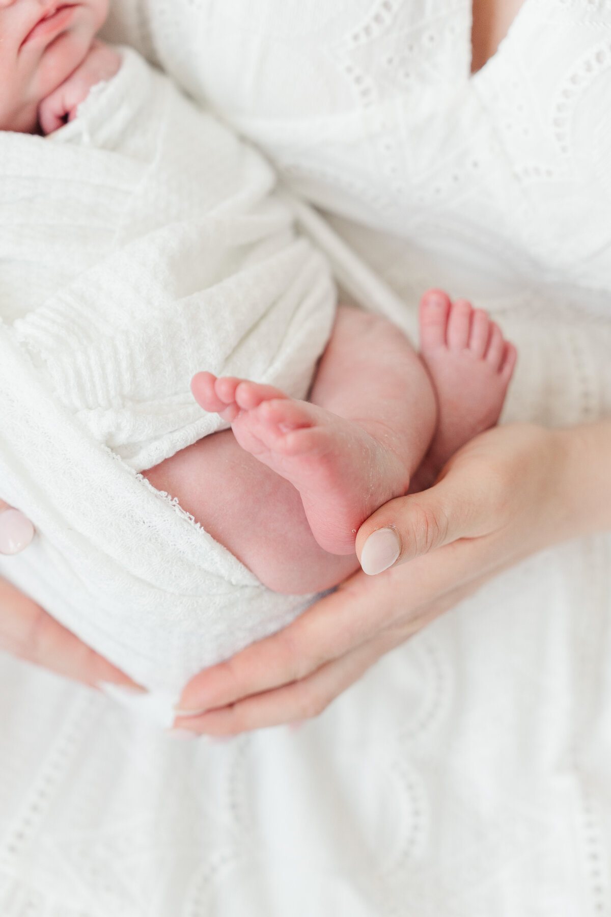 Light and neutral baby boy in home lifestyle newborn photos colorado elena spraguer photography 0050