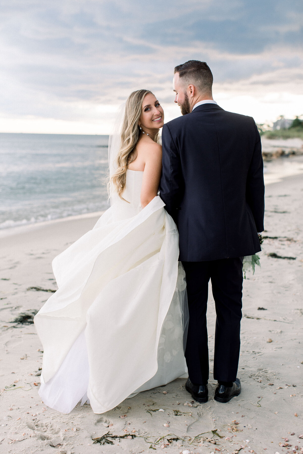bride and groom portraits on the beach at cape cod