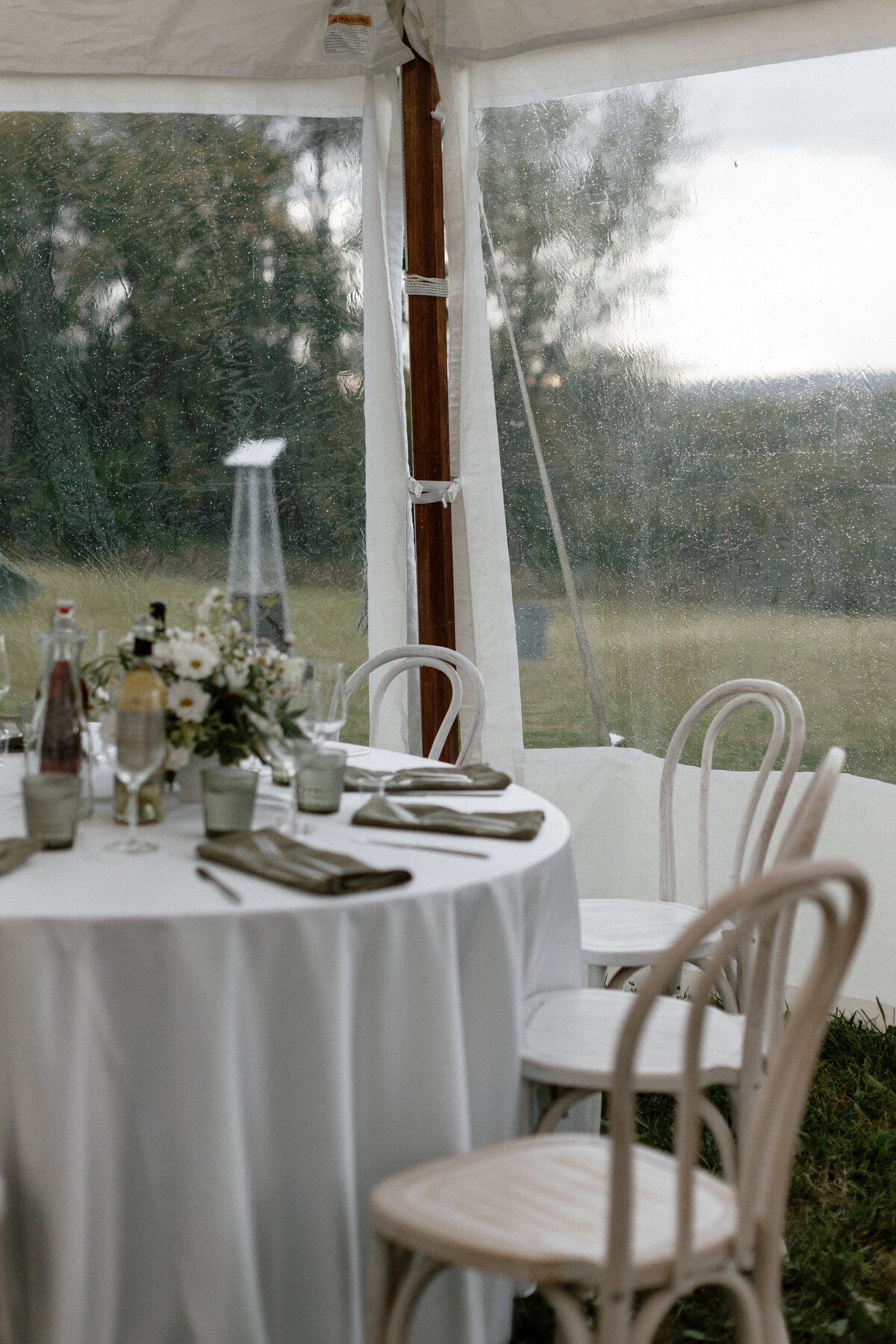 Tented wedding reception tablescape details for a private property Wisconsin wedding